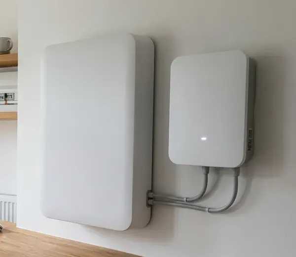 Wall-mounted home battery and inverter in a utility room